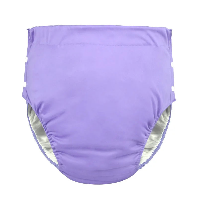 Solid purple reusable cloth baby diaper with white side snap closures for adjustable fit.