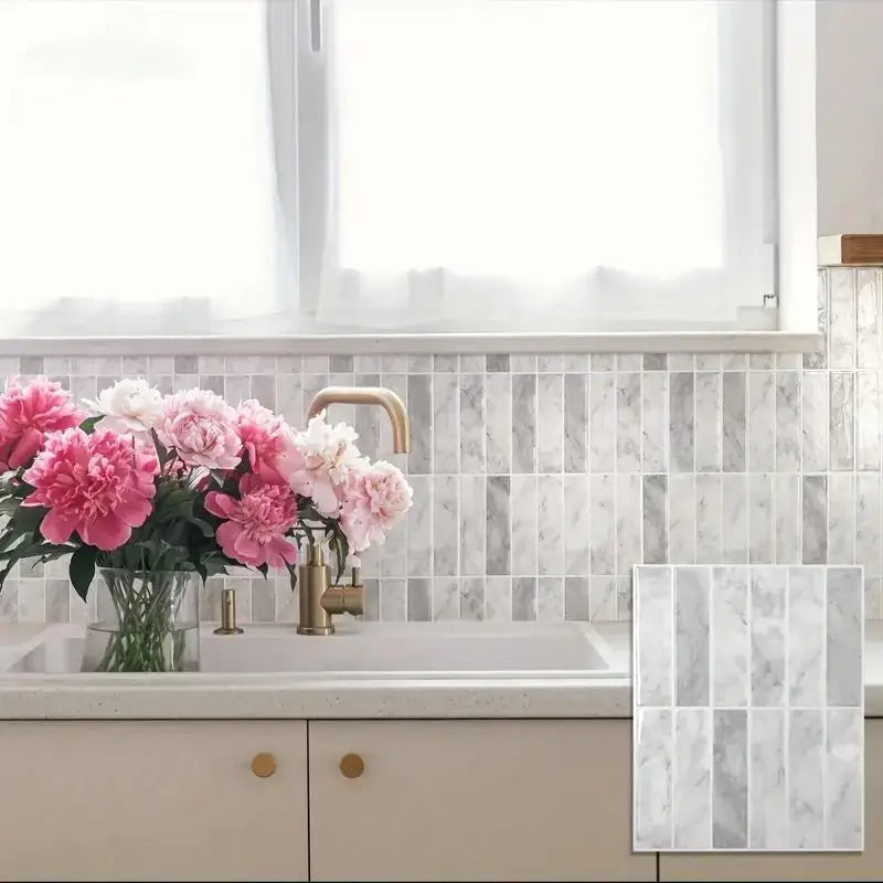 Peel-and-stick tile backsplash sticker sheet with light gray marble pattern
