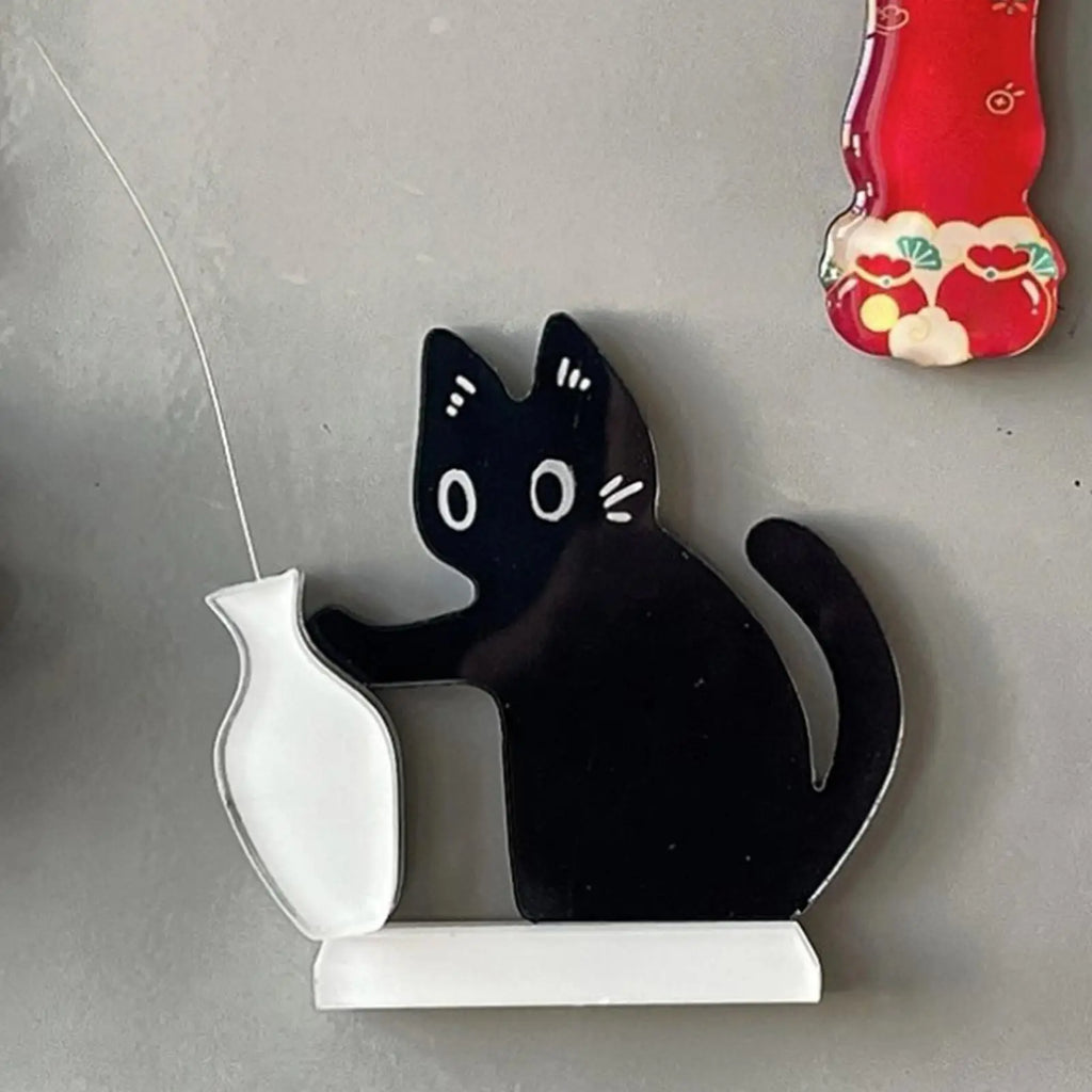 Black cat fridge magnet with white vase for pet whisker keepsake. Memorial gift decor for cat lovers.