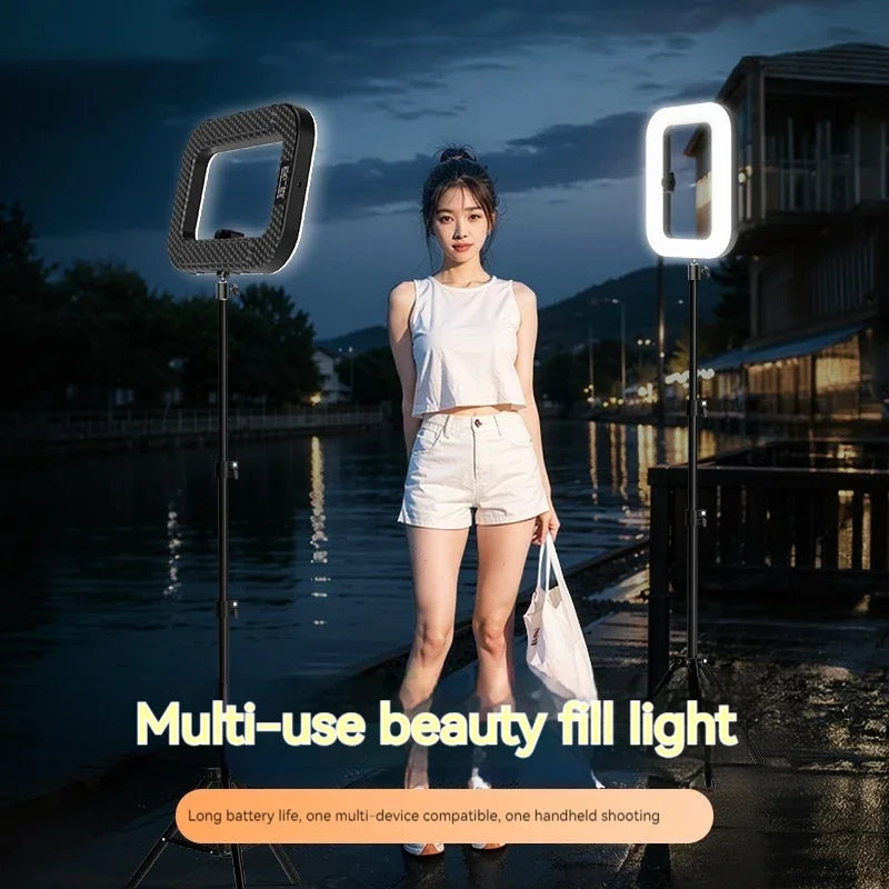 Rectangular LED fill light on adjustable tripod stand with carbon fiber-style finish for photography and video.