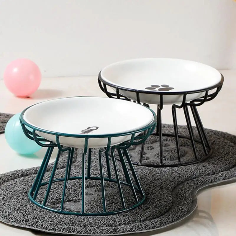 Raised ceramic pet bowls with metal stands for comfortable cat and dog feeding. Durable, stylish, and elevated design.