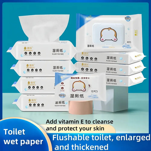 Qianhui flushable wet wipes for baby care, 12-count and 40-count packs with cute hamster design packaging.