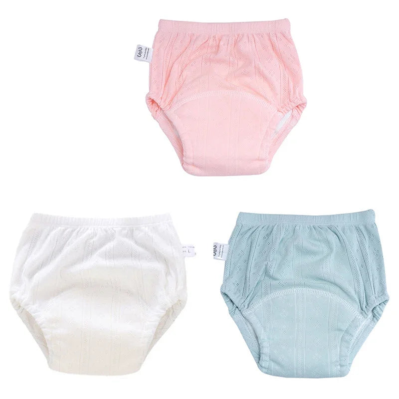 Three-pack of baby cotton training diapers in pink, white, and blue, size L, for toddler potty training care.