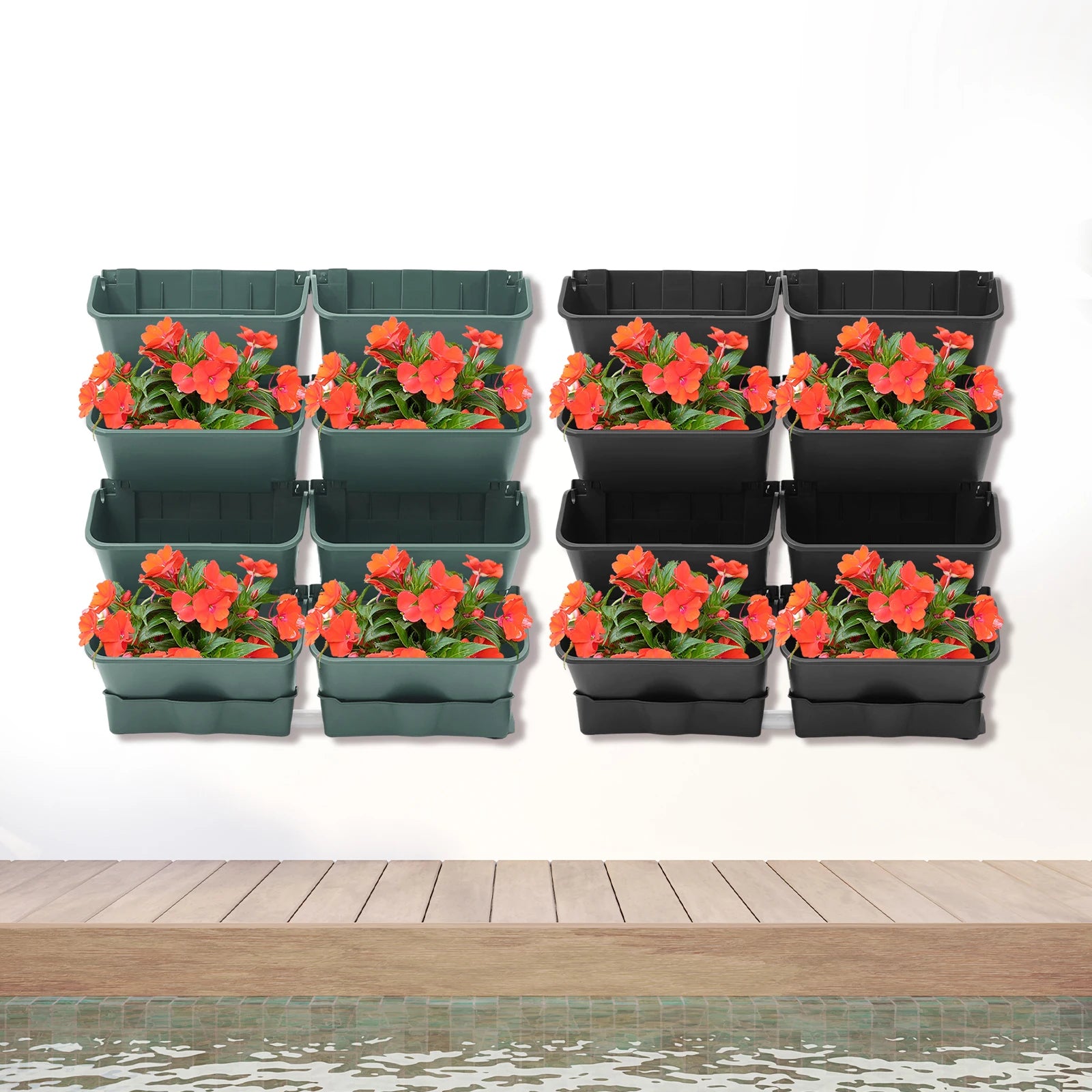 Wall-mounted vertical planter set with orange flowers in green and black planters