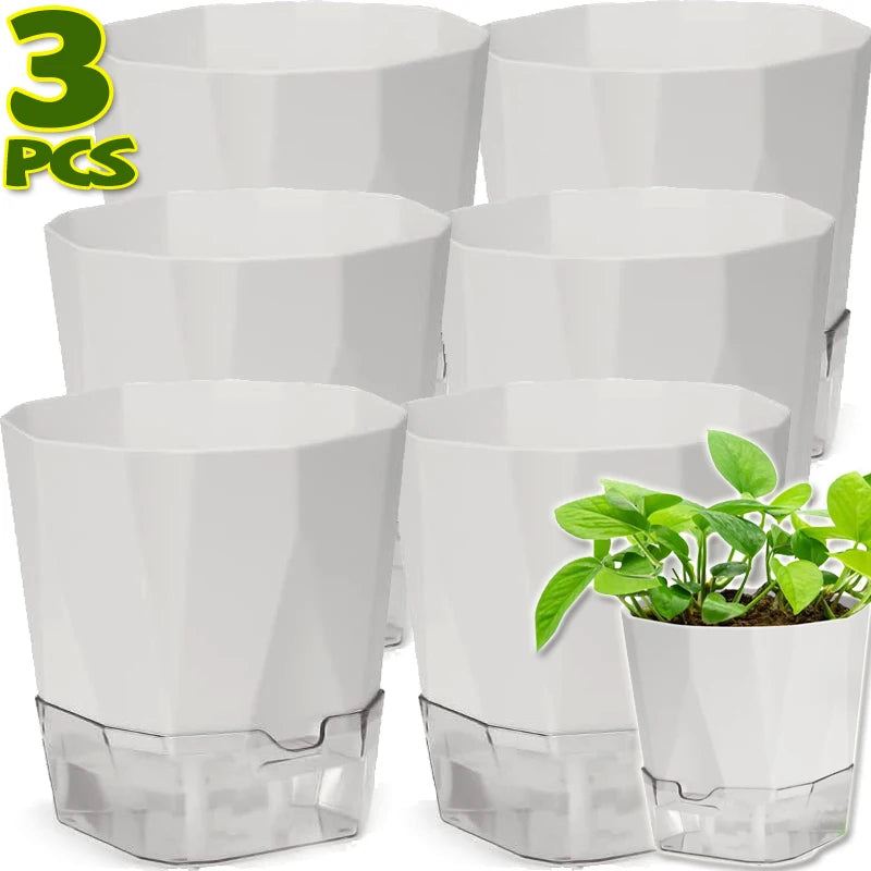 Set of three white self-watering plastic planter pots with clear reservoir bases