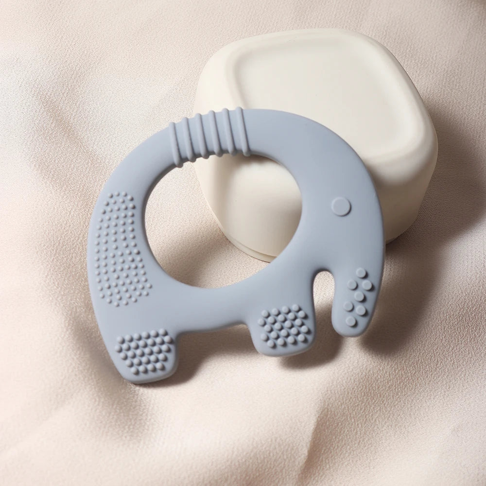 Blue elephant silicone baby teething ring toy for infant gum relief.