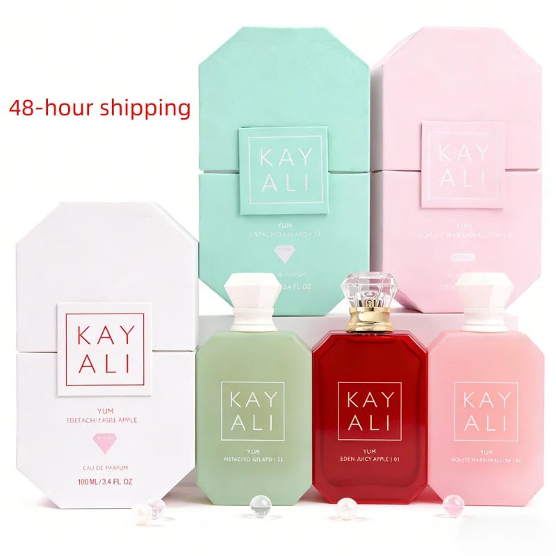 Kayali Yum Eau de Parfum collection: 100ml unisex fragrance bottles featuring Pistachio Gelato, Apple, and Marshmallow.
