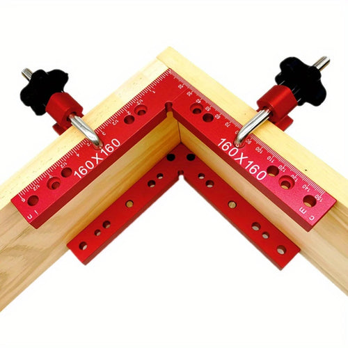 Woodworking corner clamp set with red right-angle rulers, metal rods, and black knobs