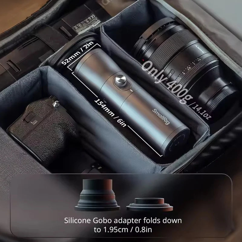 SmallRig projection attachment in a camera bag, featuring a gray cylindrical body and a collapsible silicone gobo