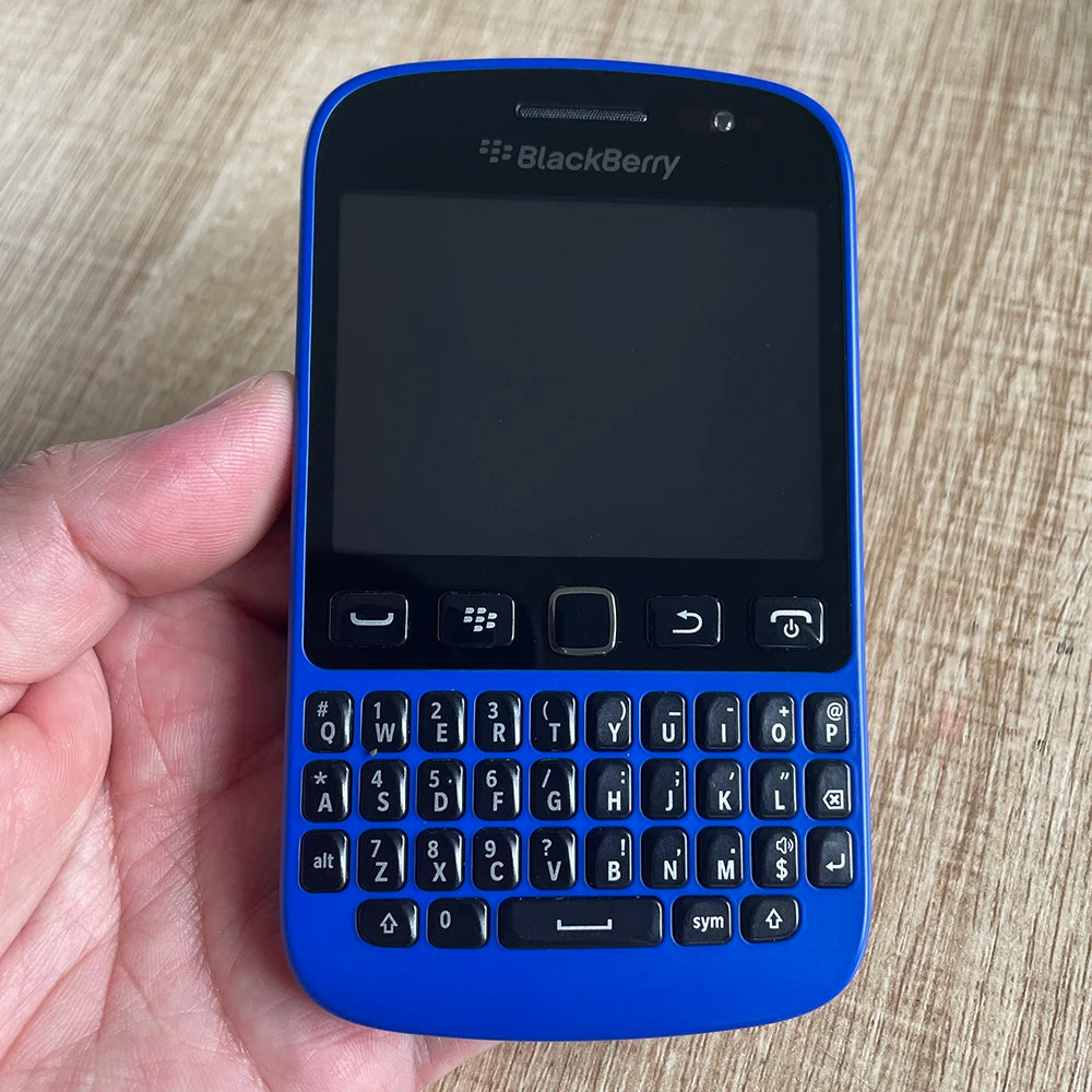 BlackBerry 9720 Samoa unlocked smartphone with blue body and front QWERTY keyboard