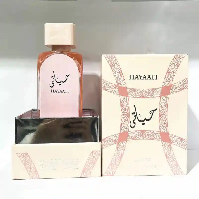 Hayaati Florence EDP for men: Rectangular perfume bottle with cream and pink Arabic-patterned gift box. 100ml.