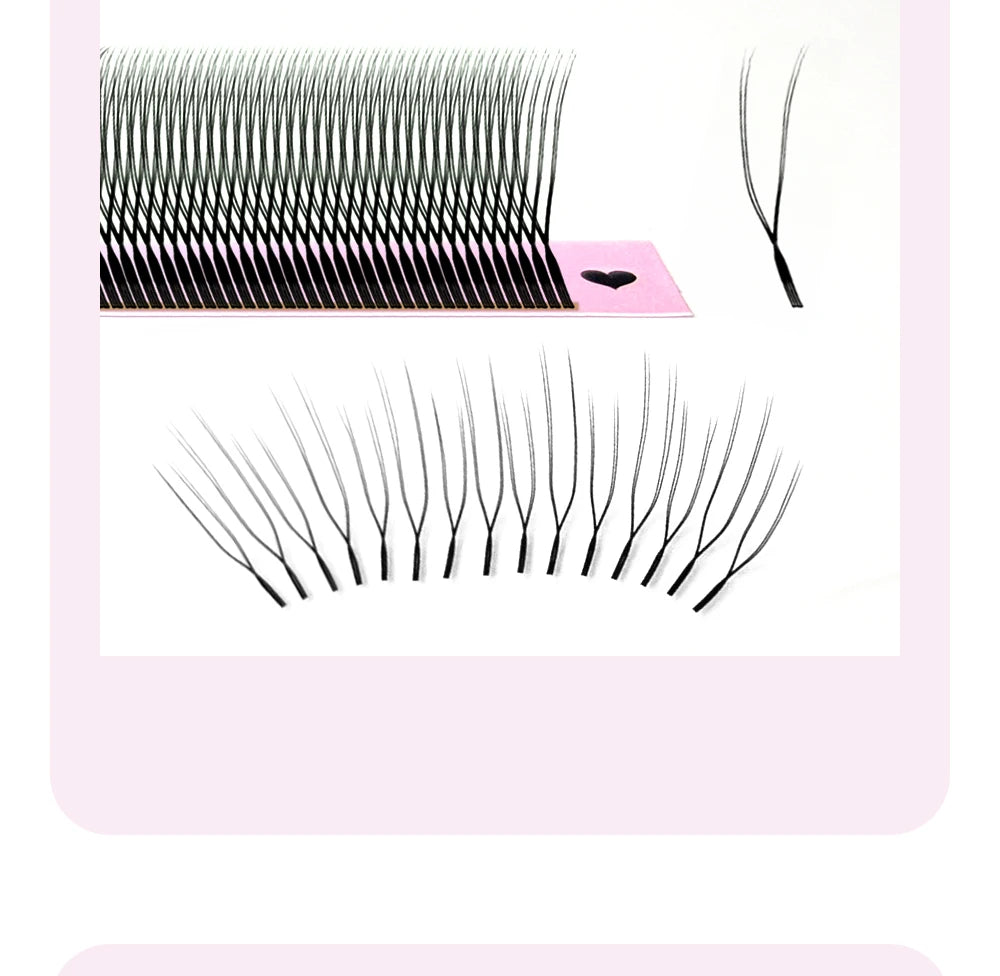 Black U-shaped YY eyelash extensions on a pink adhesive strip, showcasing a lightweight, bifurcated design.