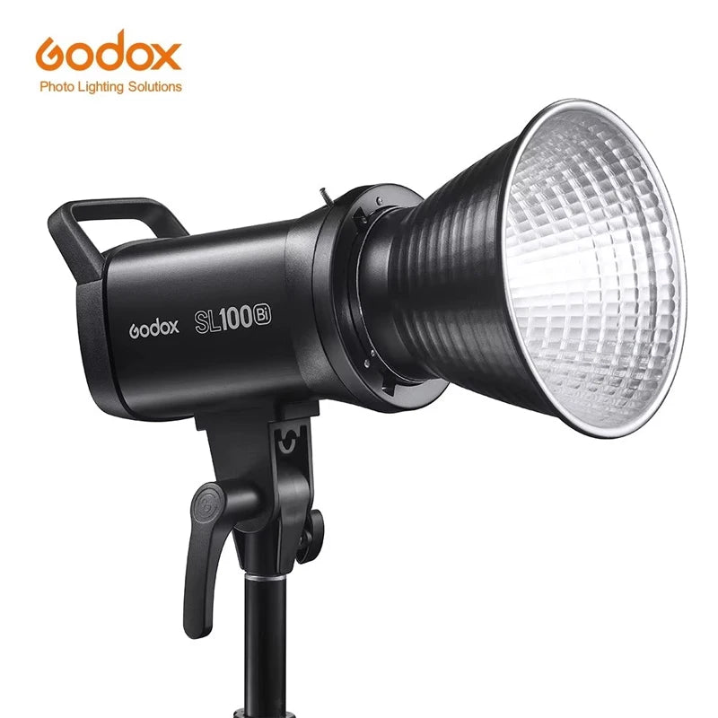 SL100Bi LED video light in black with a silver reflective reflector bowl, mounted on a stand for studio photography.