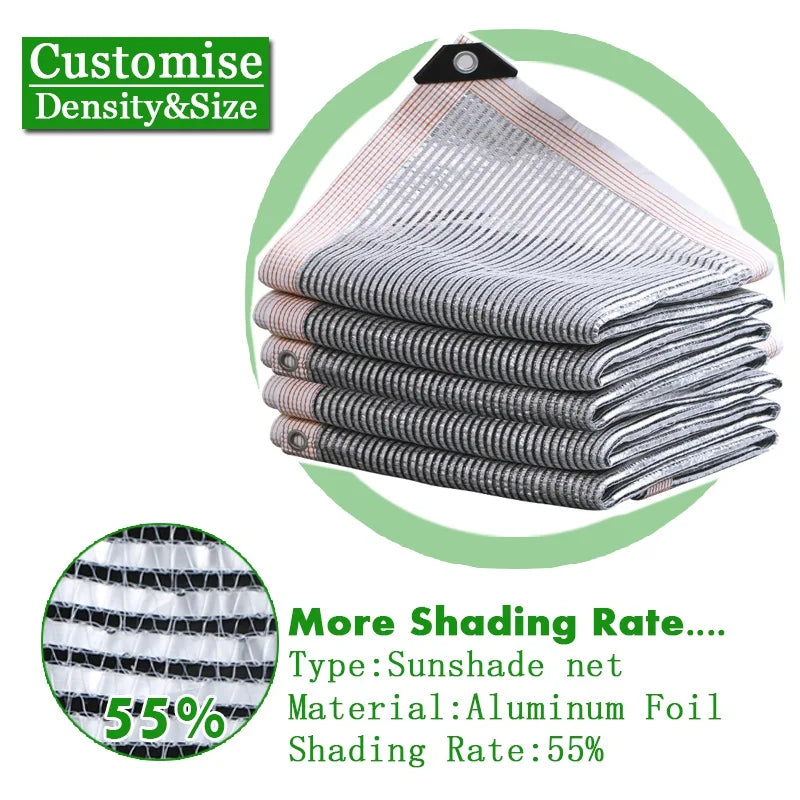 Silvery aluminum foil sunshade net, folded with grommets; 55% shading rate.