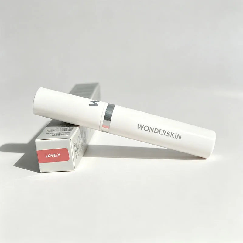 Wonderskin peel-off lip tint in "Lovely" shade. Waterproof, long-lasting matte lip gloss in sleek white packaging.