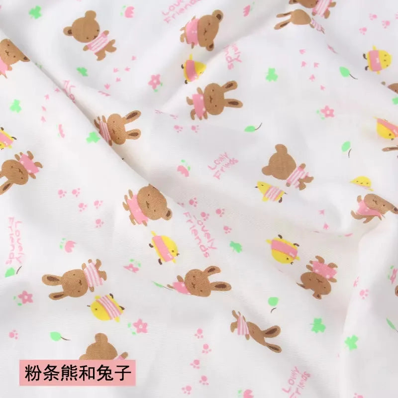 White knit jersey fabric with cute brown bear and bunny print, yellow chicks, and pink flowers for baby garments.