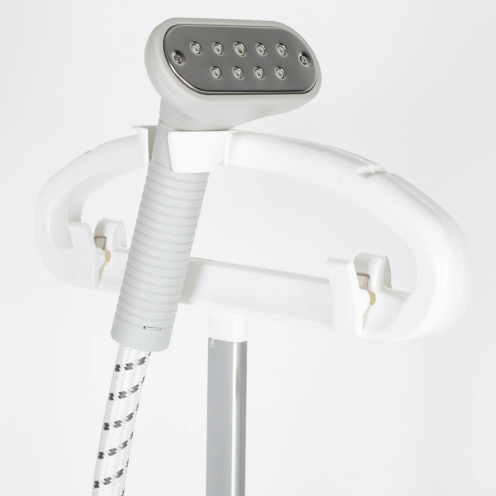 Tidesmit light pink standing garment steamer featuring versatile flat and hanging ironing modes for clothing care