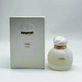 Maison Asmar Milky Way EDP 100ml: Unisex perfume with milk, caramel, plum, vanilla, tonka, sandalwood in a round bottle.