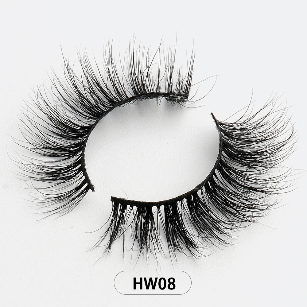 Pair of wispy, black 3D mink false eyelashes on a thin, flexible band against a plain white background. Label: HW08.