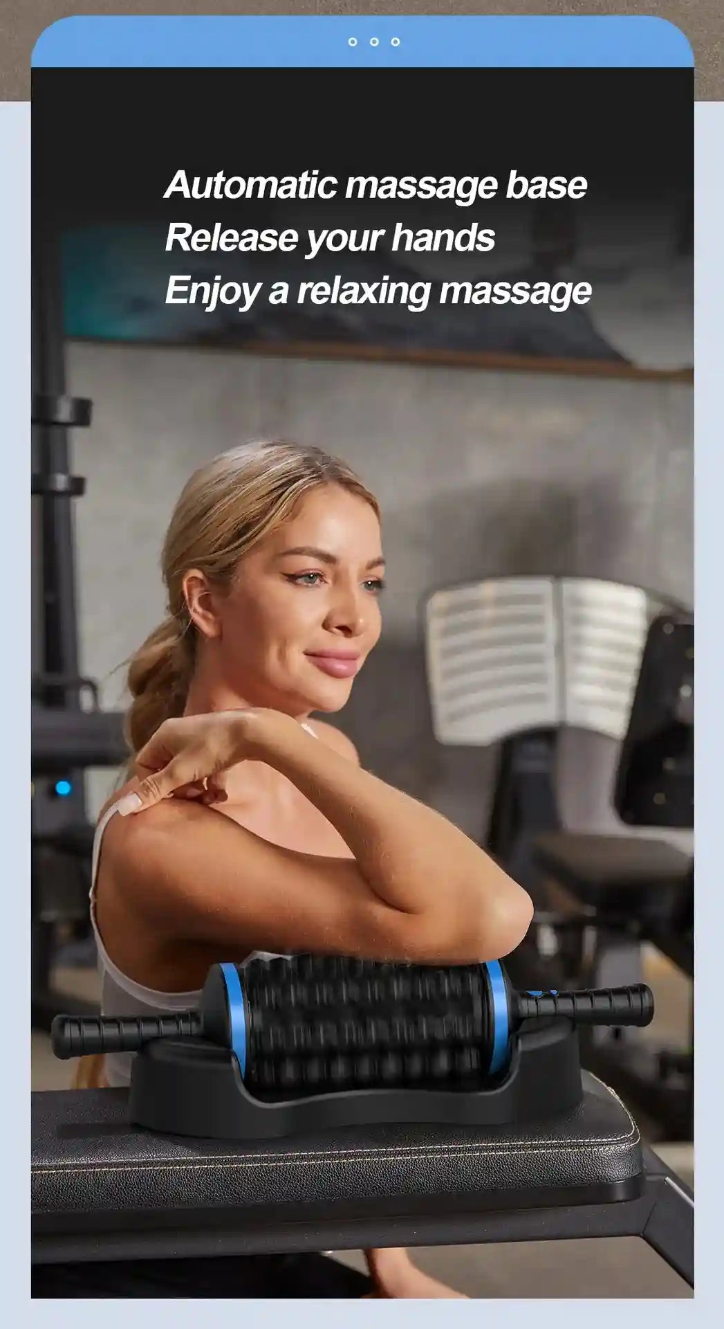A woman leans her arm on a black and blue cylindrical massage roller resting on a matching base in a gym setting.