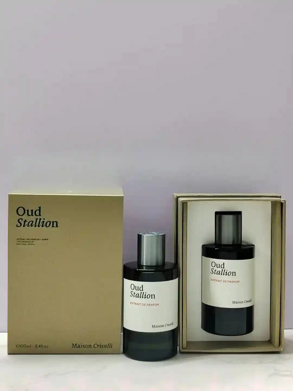Maison Crivelli Oud Stallion unisex Extrait de Parfum. 100ml black cylindrical bottle with gold gift box set.