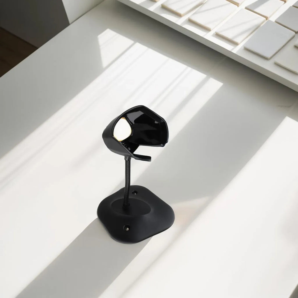 Adjustable barcode scanner bracket stand on desk surface, black