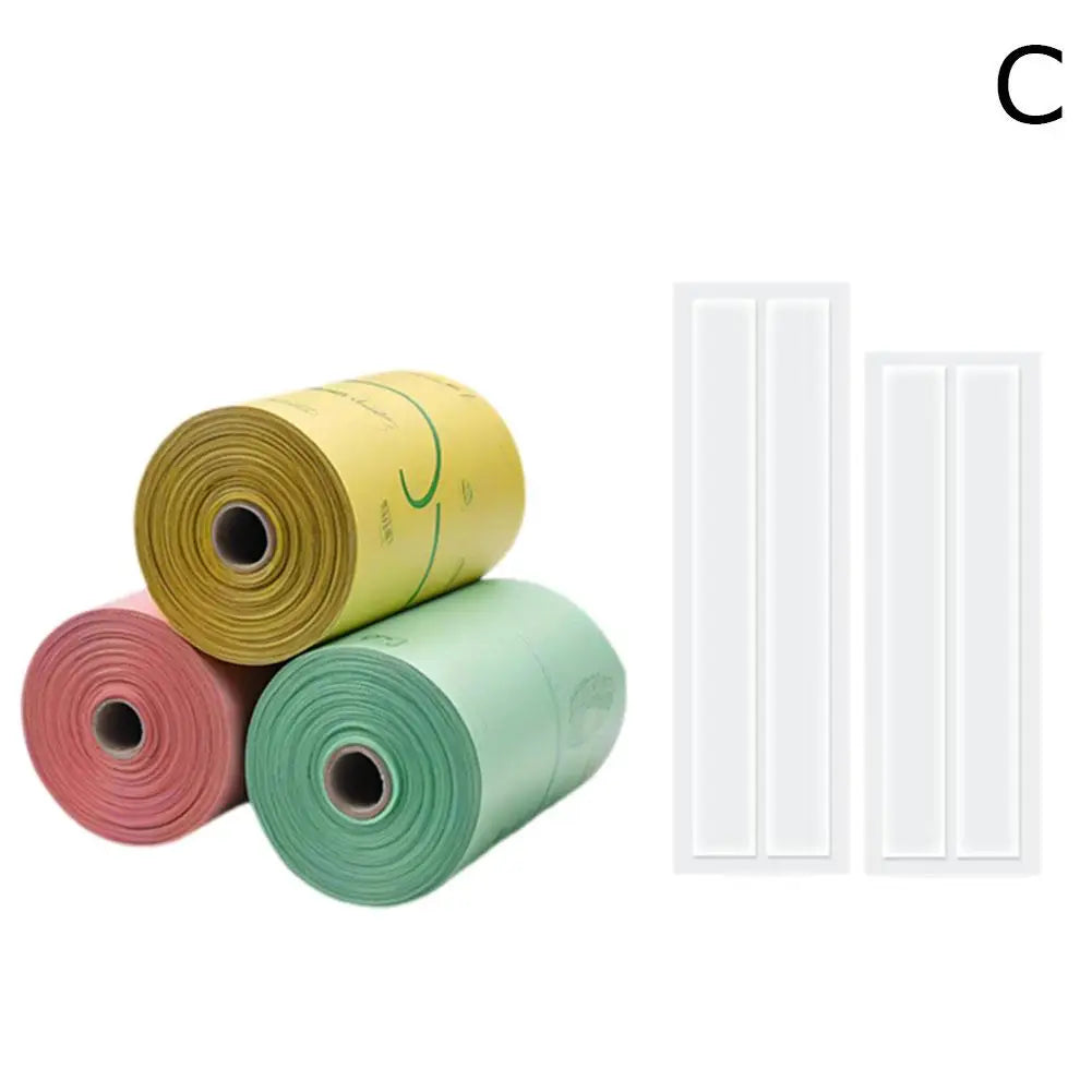 Eco-friendly multi-colored dog poop bags and adhesive strips for easy, sanitary pet waste cleanup and disposal.
