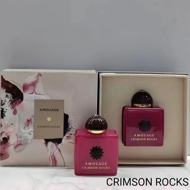 Amouage Crimson Rocks Eau de Parfum: luxurious square crimson bottle, long-lasting unisex fragrance in gift box.