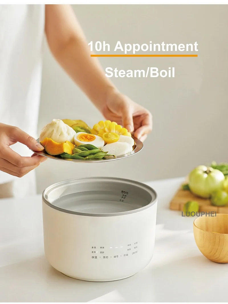 Smart white mini electric rice cooker pot with open lid and steaming food plate