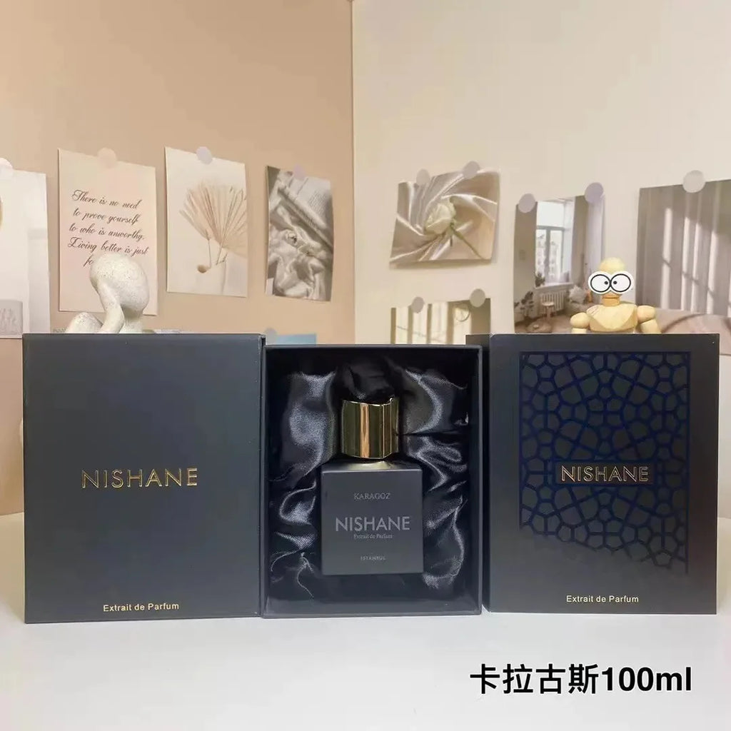 Nishane Karagoz Extrait de Parfum 100ml for men. Square black bottle with gold cap in luxury presentation gift box.