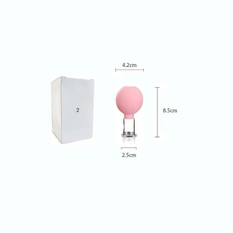 A pink rubber bulb attached to a glass facial cupping tool with dimension labels shown against a white background.