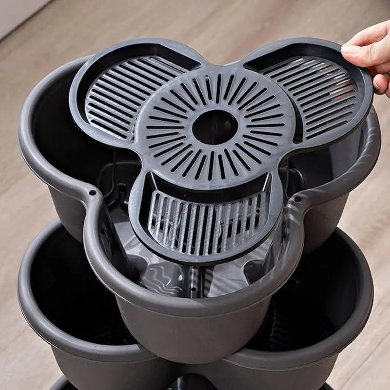 Stackable flower pot planter tower with circular vented top insert and tiered basins