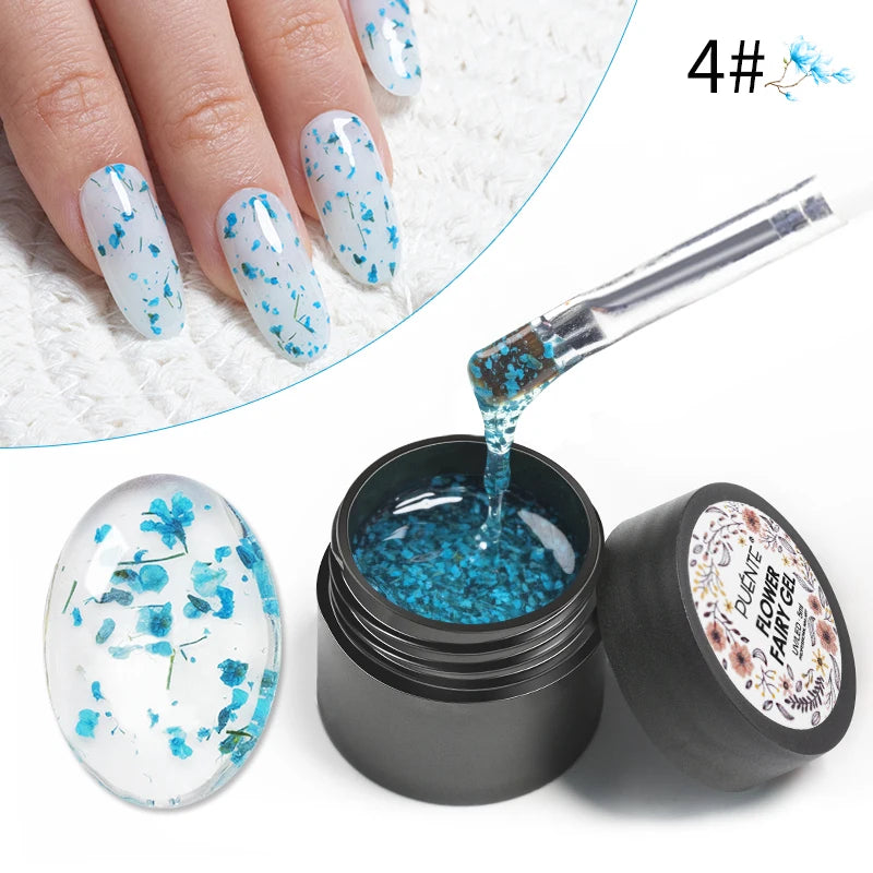 Flower Fairy gel nail polish, a clear UV gel base with tiny blue dried flower petals for decorative nail art.