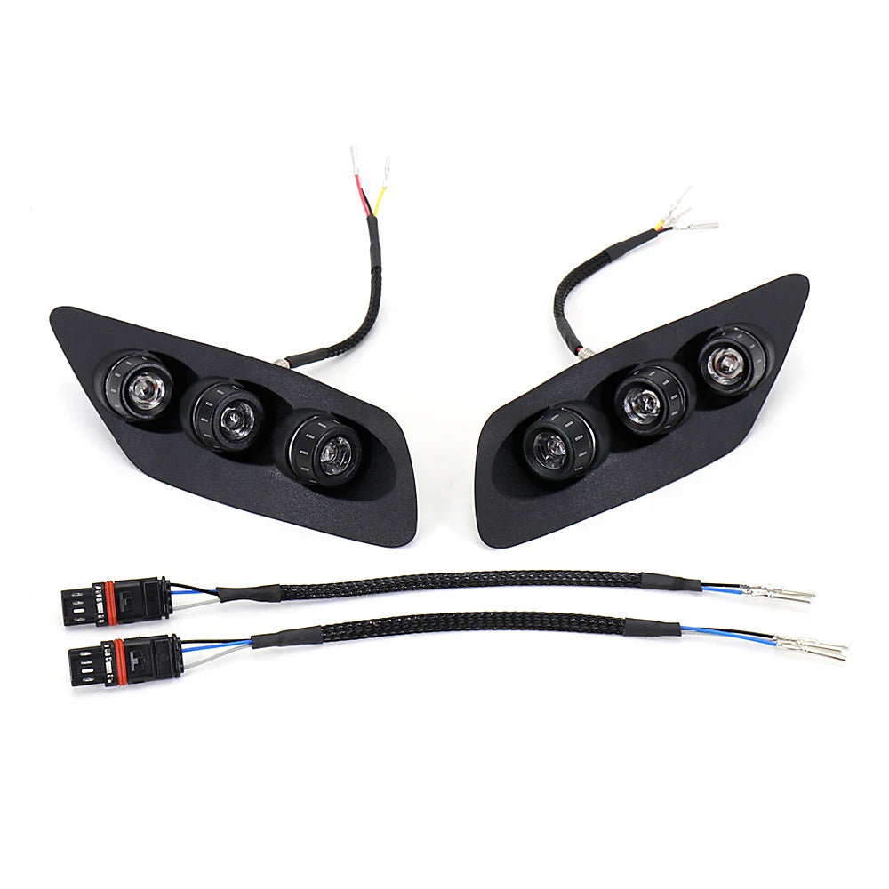 Black LED tail and turn signal light modules with multiple circular LEDs and connector wires