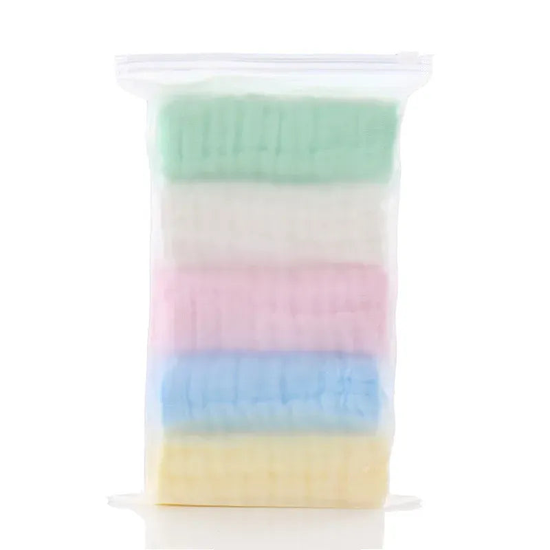 Pack of 5 colorful muslin baby washcloths for gentle skincare in a clear storage bag.