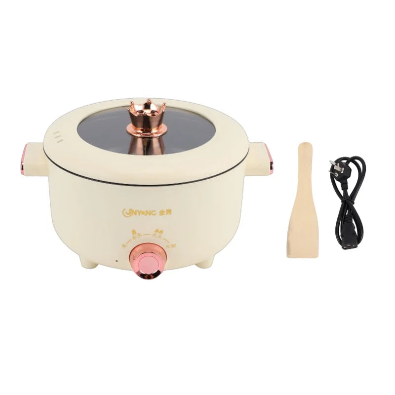 Cream electric cooker base with copper burner top, front dial, included spatula and power cord