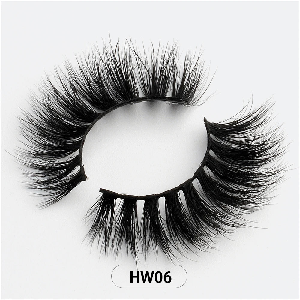 Black 3D mink false eyelashes with a flexible band, arranged in a curve on a white background labeled HW06.