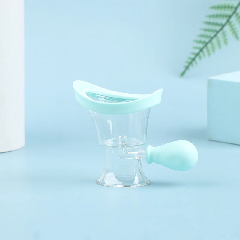 Reusable soft silicone eye wash cup with transparent basin and manual pump for gentle eye flushing and rinsing.