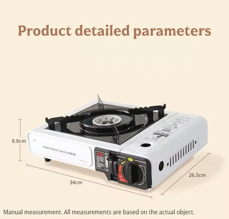 White portable cassette gas stove with front control knobs and burner grate