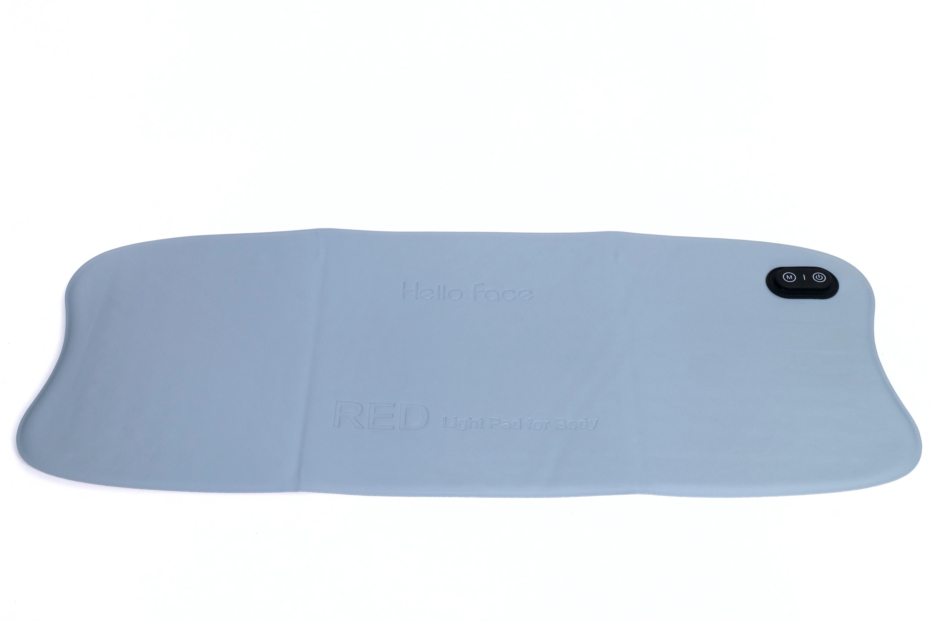 Large, light blue, flexible Hello Face red light therapy mat for the body with a black control panel on the right.