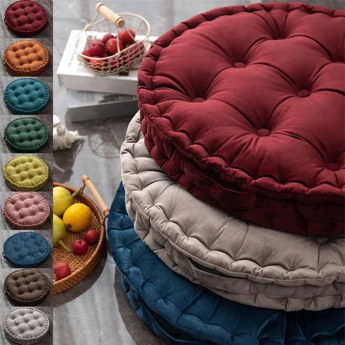 Multi-color round velvet meditation cushions for mindful yoga and peaceful floor seating.