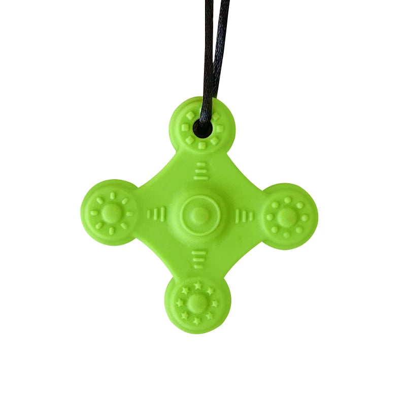 Light green silicone teething toy for baby teething relief.