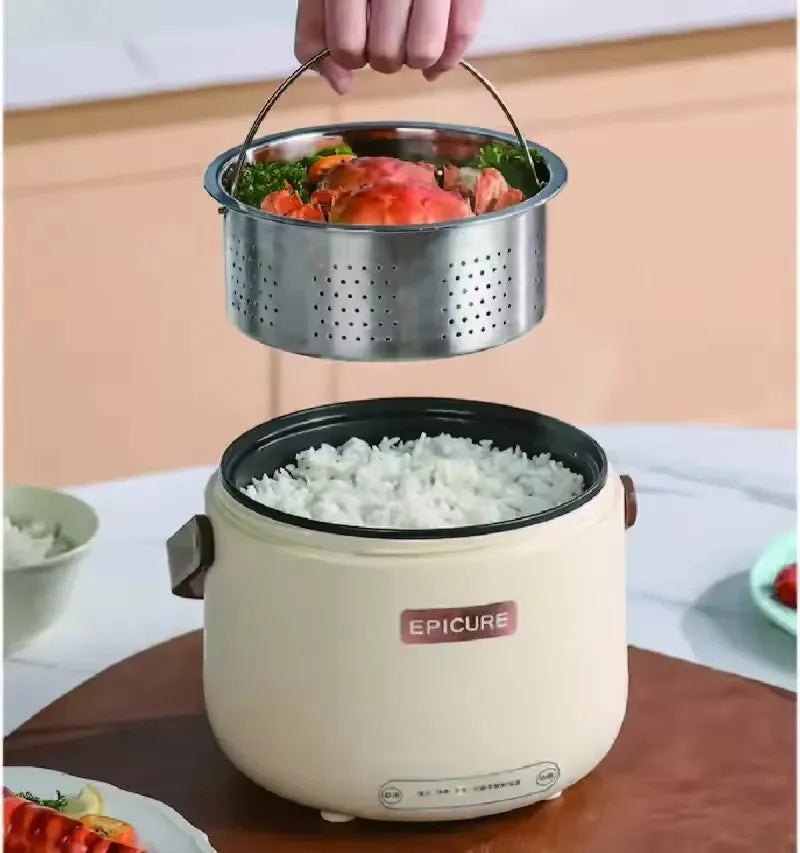 White electric rice cooker with inner pot and perforated steamer basket