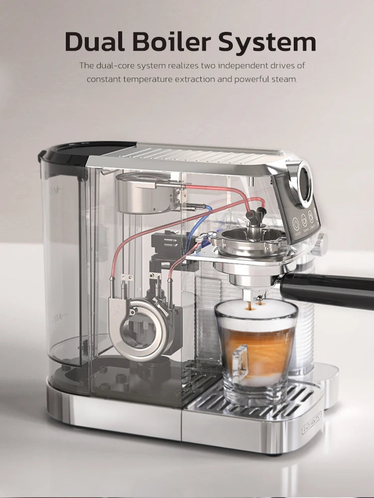 Silver stainless steel dual boiler espresso machine with transparent body, internal components, and glass cup.