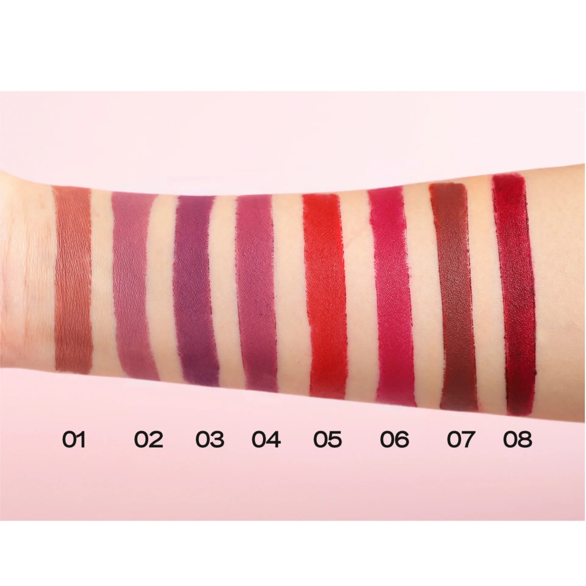 8 velvet matte lipstick shades swatched on arm, featuring long-lasting Korean colors from nude to bold red.