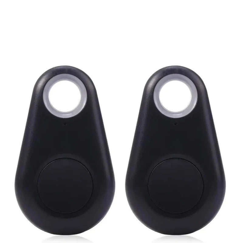Two black Bluetooth anti-lost GPS trackers for pets and keys. Smart app locator tag for easy item tracking.