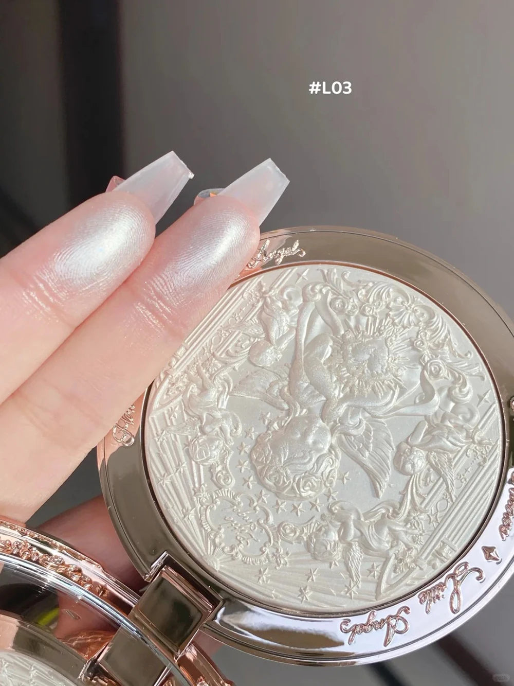 Tidesmit Flower Knows Little Angel embossed highlighter palette shimmer face makeup texture close-up