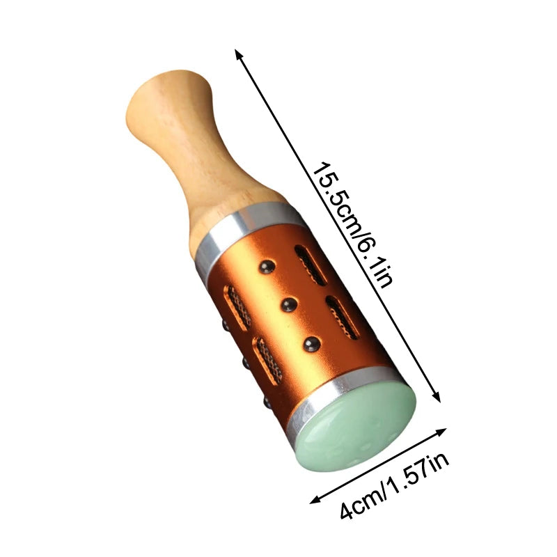 Portable warm jade facial massager with wooden handle and moxibustion heating chamber for skin tightening therapy.