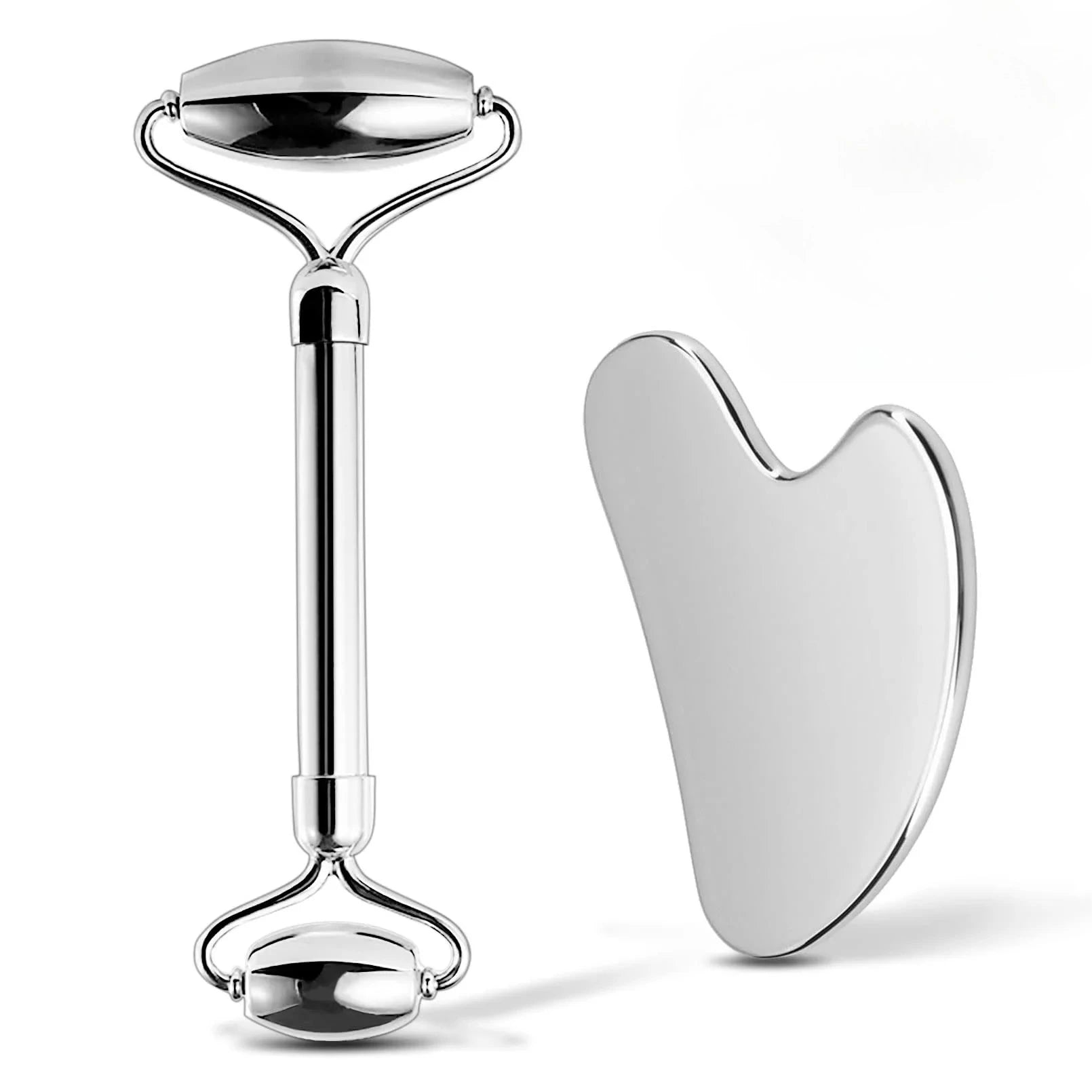 Silver stainless steel dual-ended facial roller and heart-shaped gua sha massage tool on a white background.