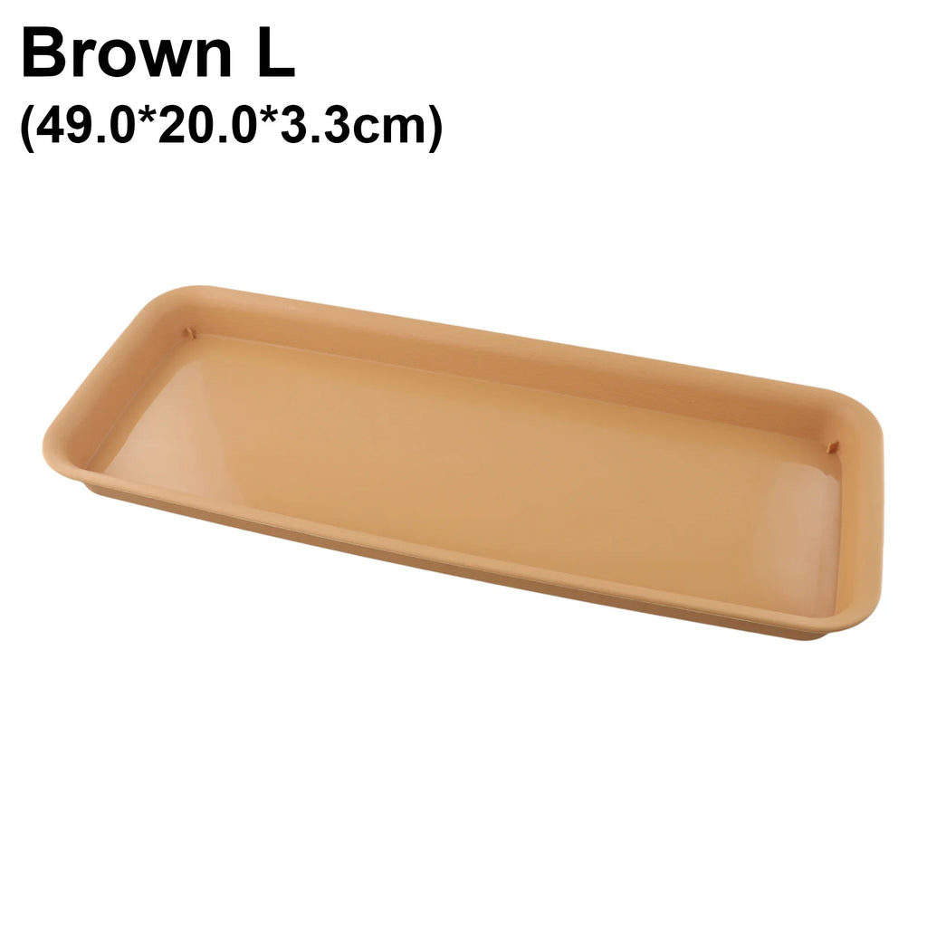 Rectangular plastic water tray, tan-brown color with shallow basin and corner lip